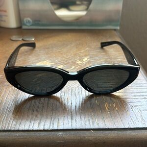 Gently used sunglasses for sale.